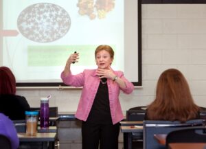 Motivational public speaker presenting to a local community group in Chicago, IL.